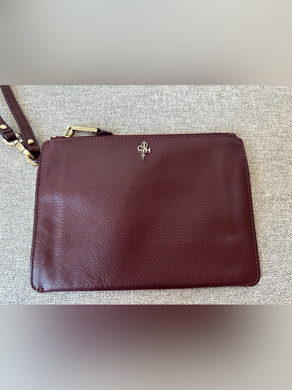 Cole Haan Burgundy Leather Strap with Gold Logo Plate Wristlet